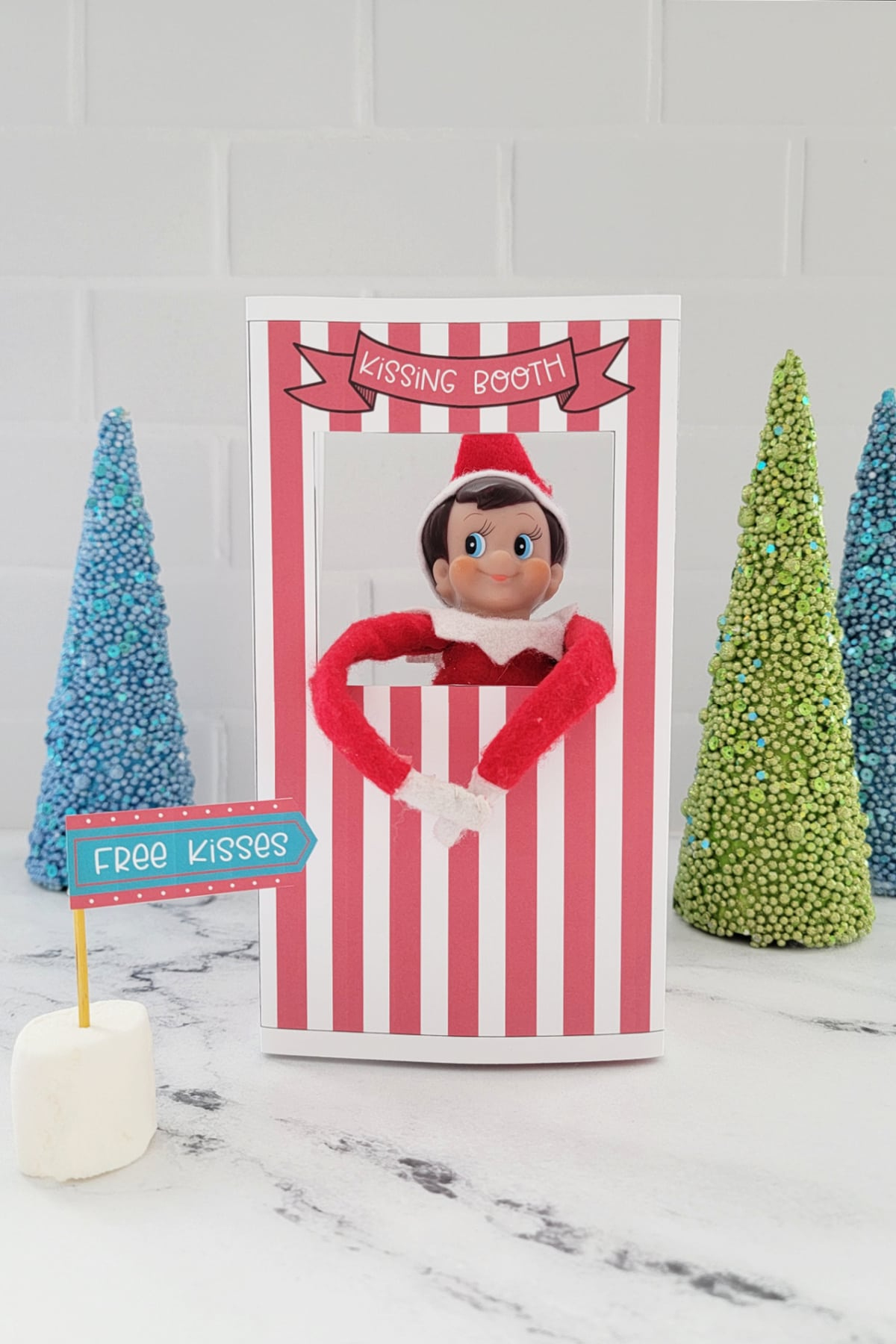 Elf On The Shelf Kissing Booth (Free Printable) - Fun Money Mom with regard to Elf On The Shelf Kissing Booth Free Printable