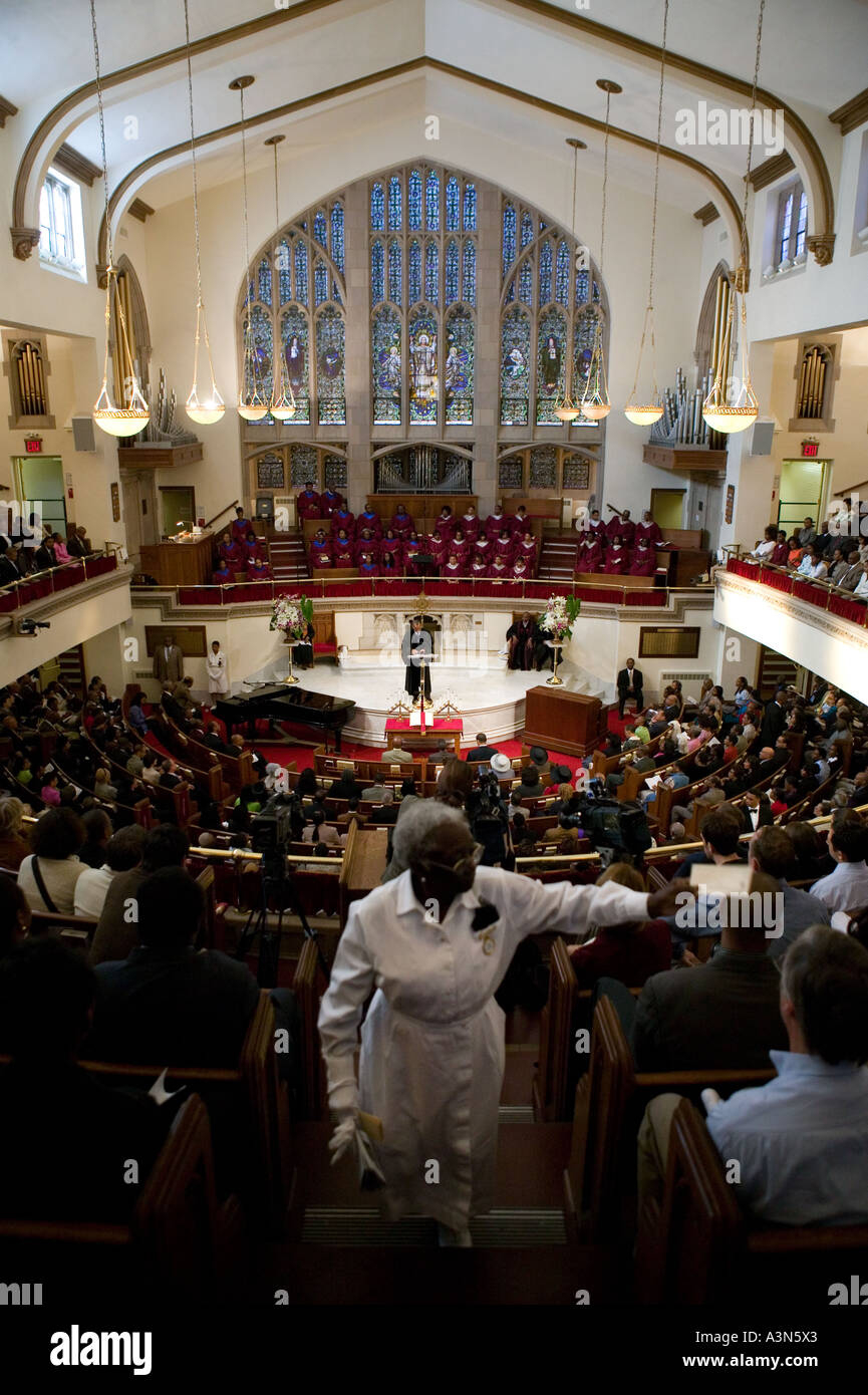 Female Usher Hands Out Prayer Sheets During Sunday Morning Mass At with Free Printable Church Usher Hand Signals